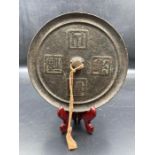 An antique Chinese bronze mirror (Approx. Dia13cm)