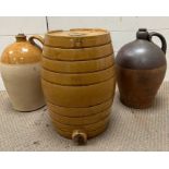 Two stoneware flagons and one stoneware glazed barrel