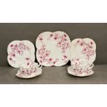 A selection of Wileman and Co white and purple floral pattern ceramics