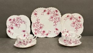 A selection of Wileman and Co white and purple floral pattern ceramics