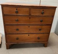 A mahogany chest of drawers with brass handles (H94cm W94cm D46cm)