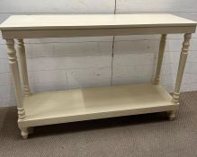 A painted console with shelf under on turned legs (H85cm W130cm D41cm)