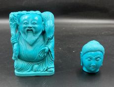 A turquoise laughing Buddha and head