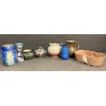 A selection of Studio Pottery to include a planter, jugs, ewers and vases