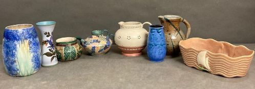 A selection of Studio Pottery to include a planter, jugs, ewers and vases