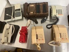 Five press button phones, one intercom and others