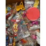 A selection of McDonalds happy meal toys including Aladdin