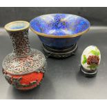 A selection of cloisonne bowls and vases