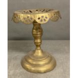 A Victorian brass trivet pot stand