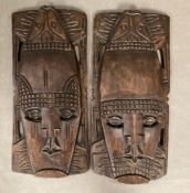 Two African mask wall hangings (H53cm)