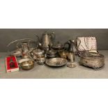 A selection of silver plate and white metal items to include tea and coffee pots