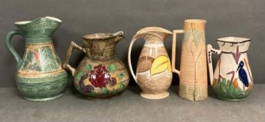 A selection of five jugs and ewers, various makers and marks
