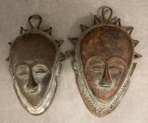 Two bronze Antique African masks (H30cm and H20cm)