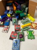 A selection of Pokemon toys, cards and Gameboy kids meal toys