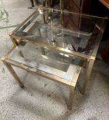 Two Mid Century metal and glass side tables