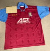 A signed Aston Villa shirt, signatures include Gareth Southgate and Dwight Yorke