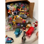 A selection of McDonalds happy meal toys including Dennis the Menace
