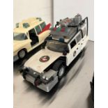 A selection of Ghostbuster cars and motorbikes