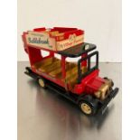 A Sylvanian Families toy bus and rabbit