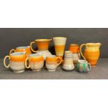 A selection of Shelly Harmony ware to include various jugs and vases