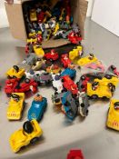 A selection of wind up McDonalds toy cars