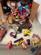 A selection of McDonalds happy meal toys including Simpsons