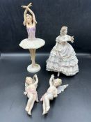 A selection of porcelain figures to include Royal Worcester