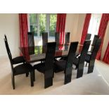 A High gloss two tone dining table with twelve black slat back chairs (305 cm Long by 110 cm wide