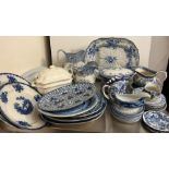 A mixed selection of blue and white china to include jugs, plates and meat platters