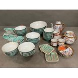 A selection of oriental style rice bowls and tea pots, etc