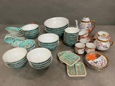 A selection of oriental style rice bowls and tea pots, etc