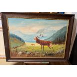 A framed oil on canvas of a Stag set in a highland scene. signed lower right 100 x 70cm