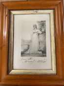 A framed print of an engraving of a lady