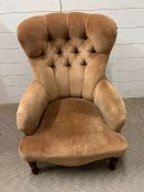 A low button back chair