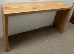 An elegant natural wood contemporary console table