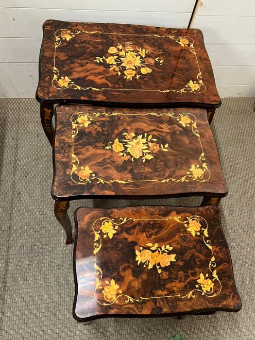 A nest of three inlaid satin wood tables