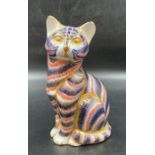 A Royal Crown Derby figure of a cat, with a gold stopper.