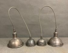 Two brushed steel industrial style ceiling lamps