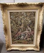 A tapestry of a classical scene in a Louis style frame
