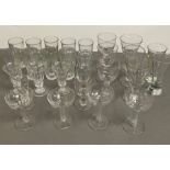 A selection of glassware including Art Deco hollow stem couples, cordial glasses