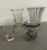 Four glass vases and celery vases