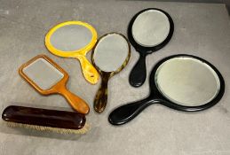 Five hand held vintage mirrors and a brush
