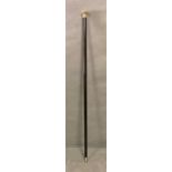 A Gold Metal topped walking cane inscribed: Presented to J Stewart on the occasion of his visit to