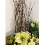 A selection of faux flowers and twisted willow