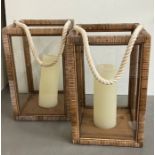 A pair of glazed and rattan large lanterns 46cm x 30cm sq