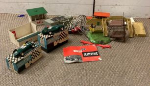 A selection of Vintage Scalextric equipment to include cars , transformer etc