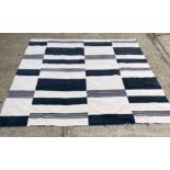 A blue and white wool contemporary rug 335cm x 345cm