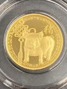 A Far Eastern 1/10 ounce .999 Pig themed gold medallion