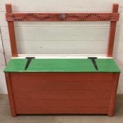 A wooden plank storage box seat 96cm H x 92cm W