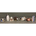 A selection of Royal Crown Derby animals to include a bull dog, duck, otter and a reclining owl.